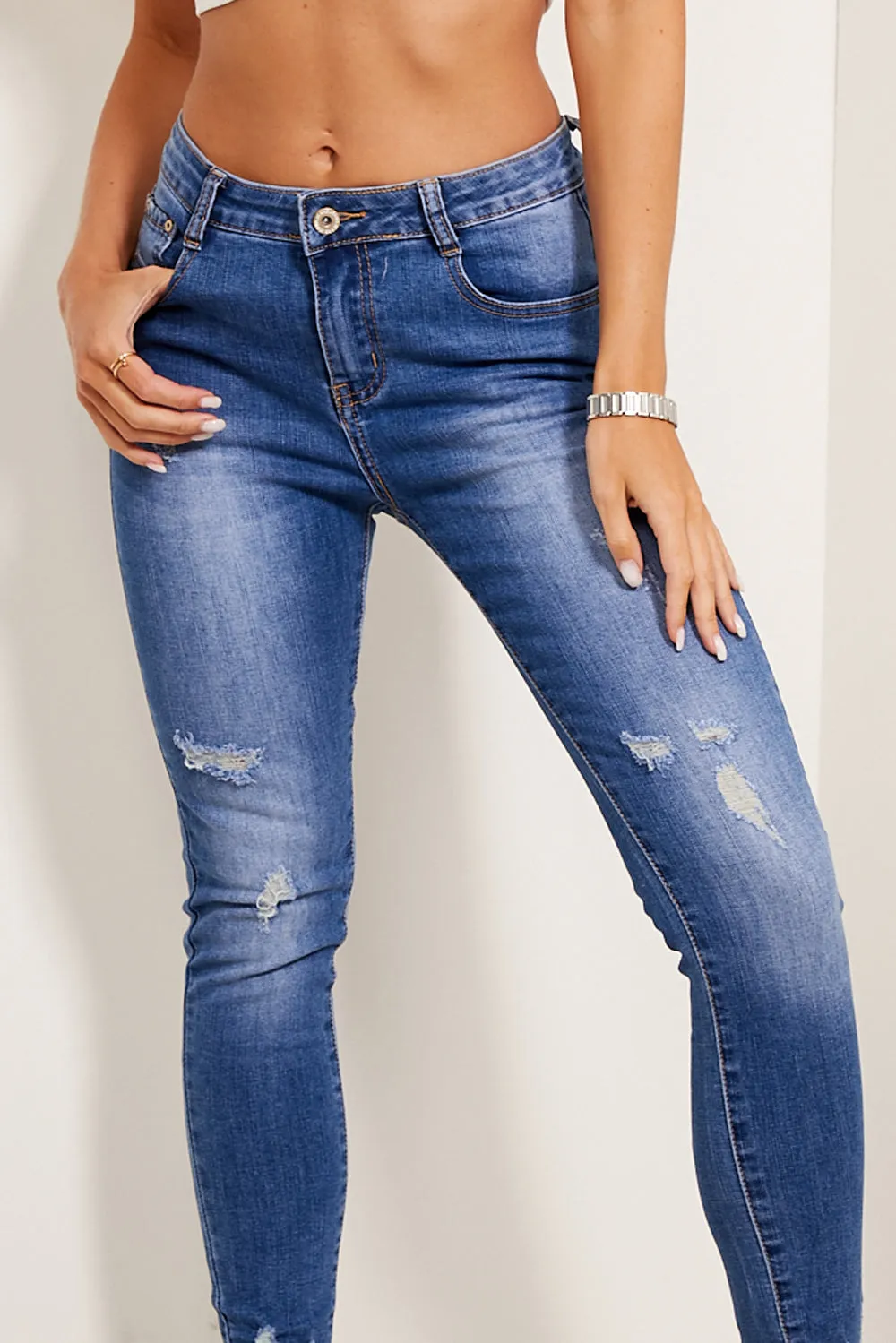 Mid Blue Wash Distressed Fray Hem Jeans