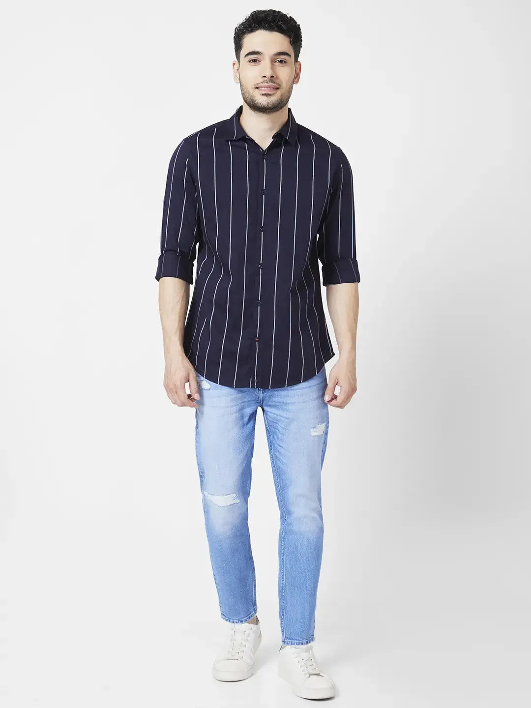 Spykar Men Light Blue Cotton Slim Fit Tapered Length Mild Distressed Mid Rise Jeans (Kano)