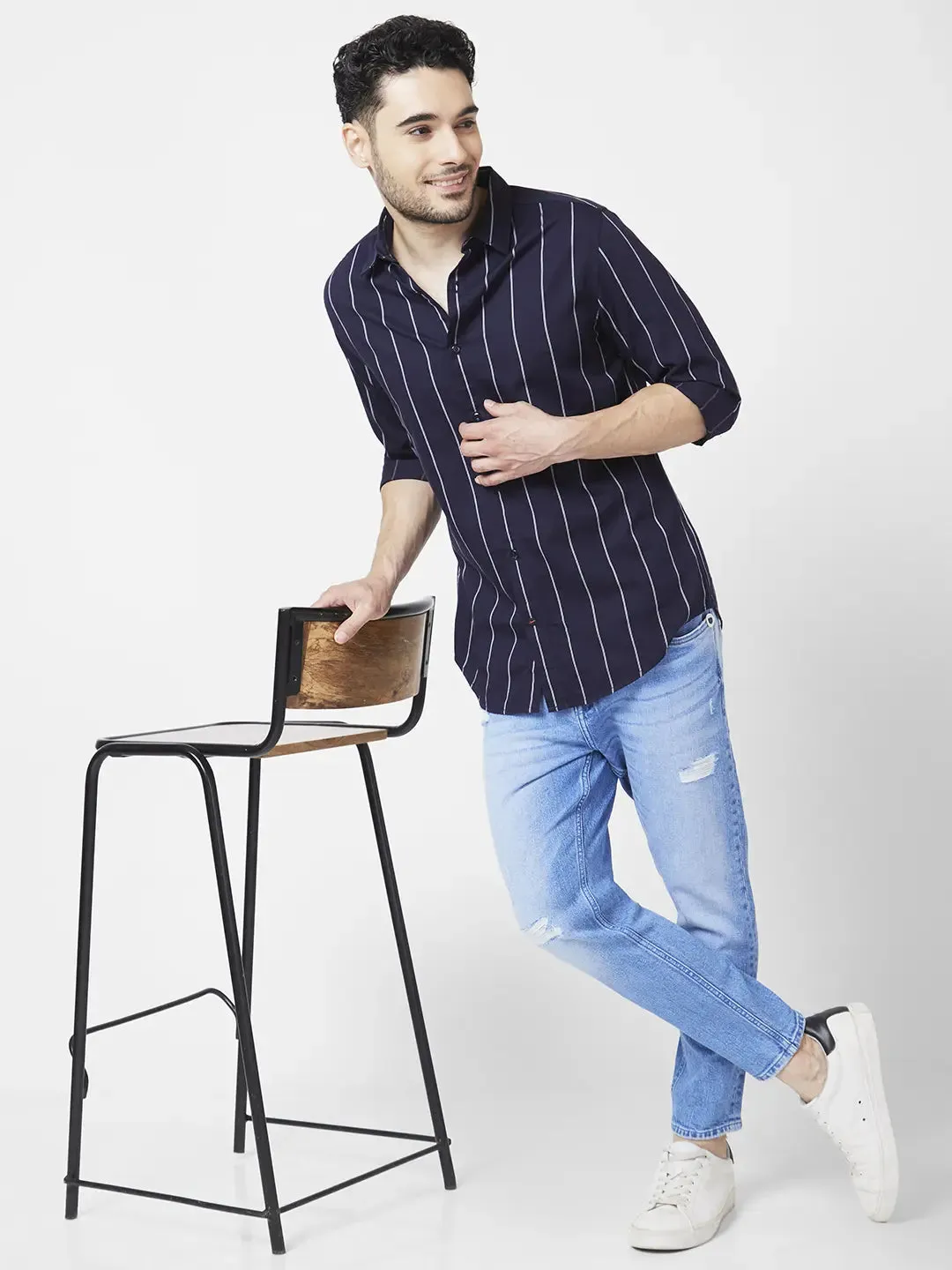 Spykar Men Light Blue Cotton Slim Fit Tapered Length Mild Distressed Mid Rise Jeans (Kano)