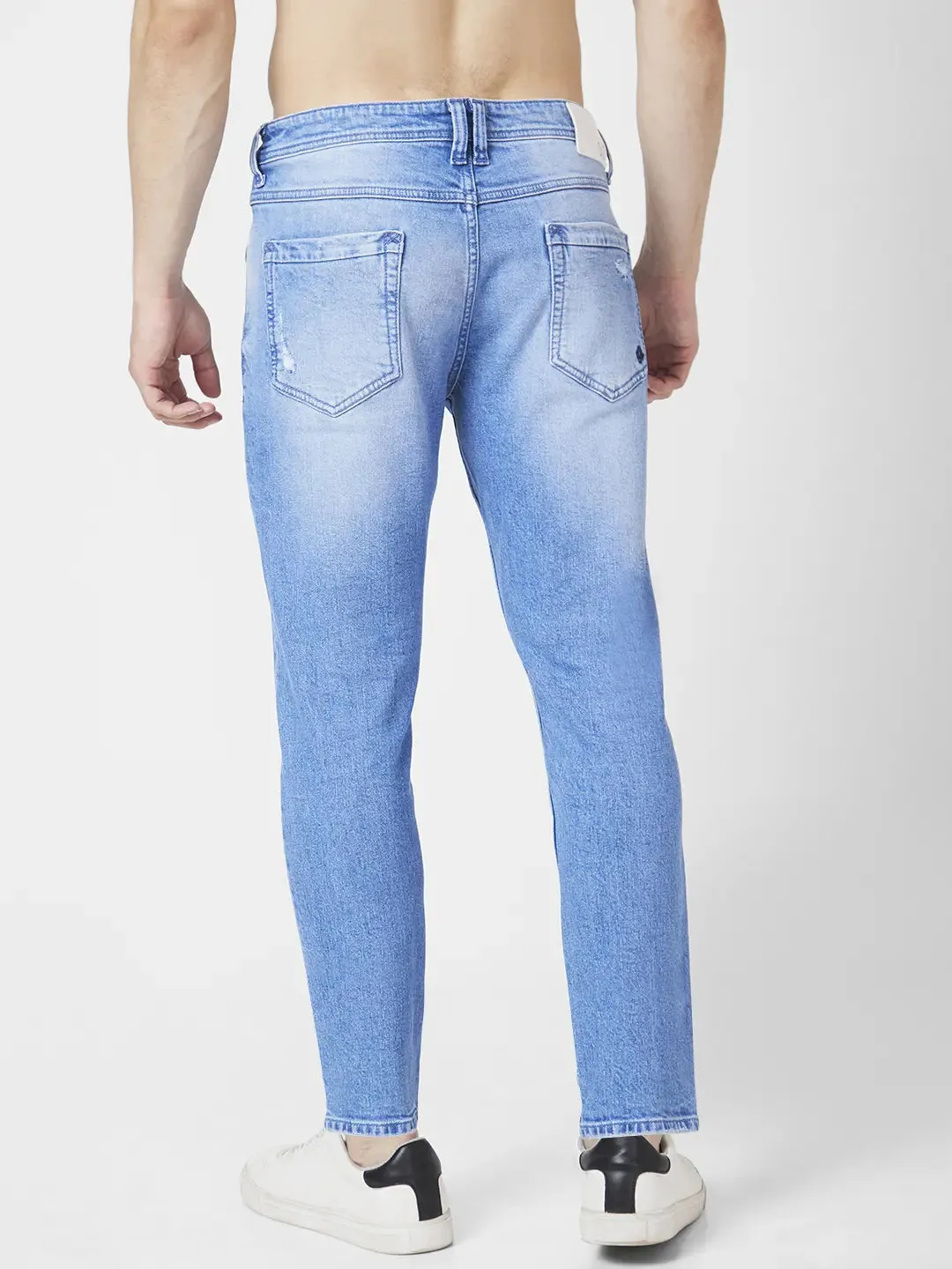 Spykar Men Light Blue Cotton Slim Fit Tapered Length Mild Distressed Mid Rise Jeans (Kano)