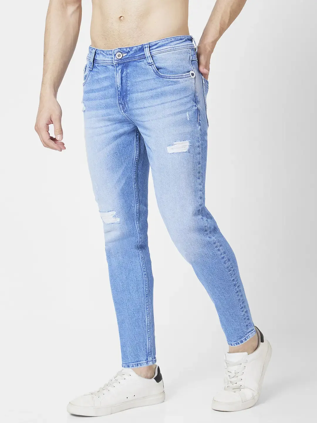 Spykar Men Light Blue Cotton Slim Fit Tapered Length Mild Distressed Mid Rise Jeans (Kano)